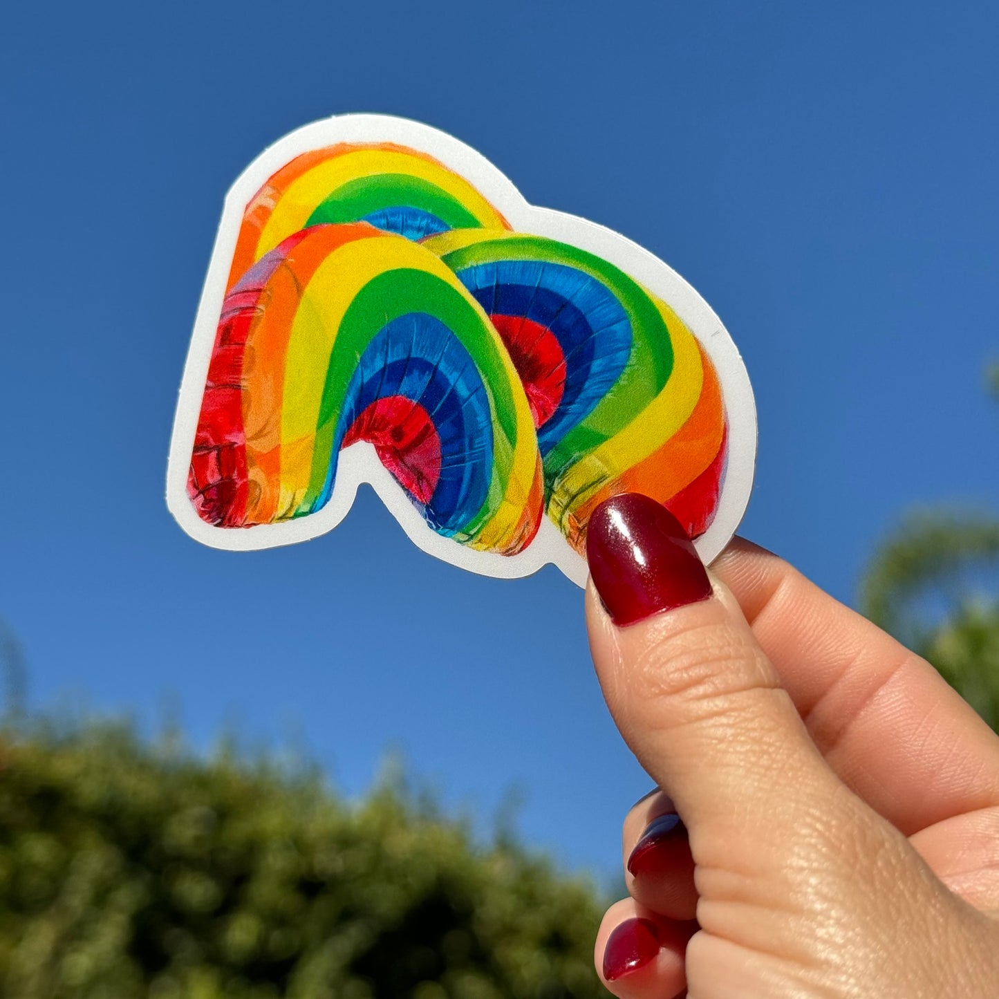 Persiguiendo arcoiris Pegatina